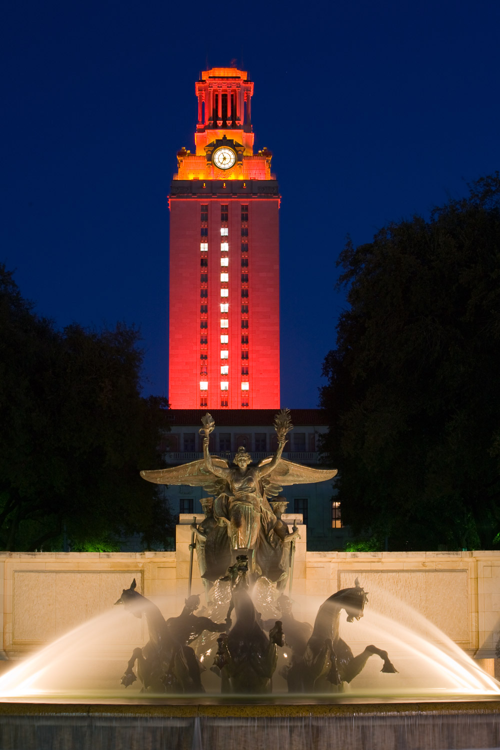 UT Austin tower lit orange at night